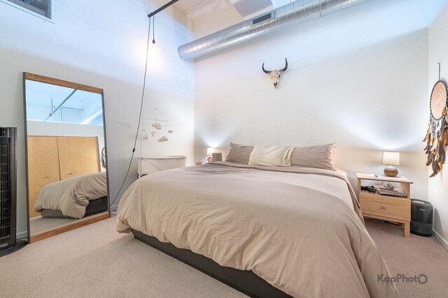 bedroom featuring carpet