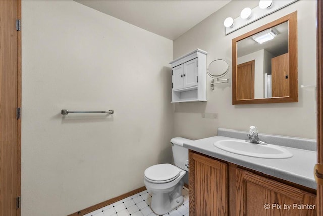 1109 Adams Ave, Wauconda, IL 60084 - half bath featuring vanity, toilet, and baseboards