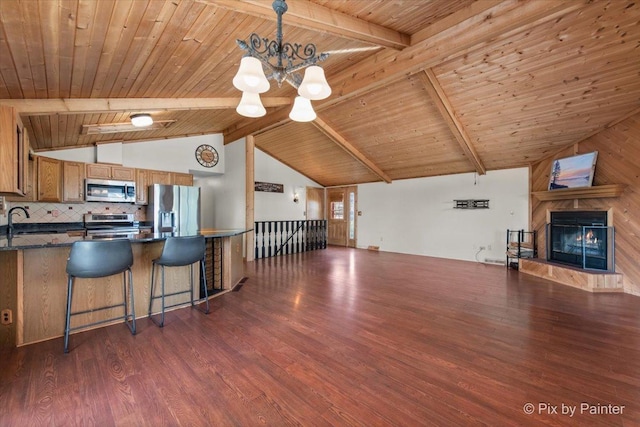 1109 Adams Ave, Wauconda, IL 60084 - kitchen featuring appliances with stainless steel finishes, open floor plan, wooden ceiling, wood finished floors, and a chandelier