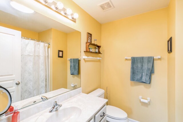 101 Boathouse Rd, Pingree Grove, IL 60140 - bathroom featuring toilet, vanity, and baseboards