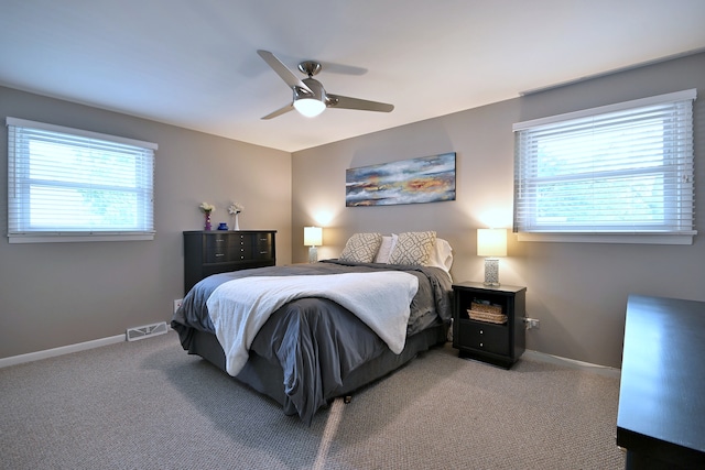 741 E Division St, Lombard, IL 60148 - bedroom featuring light carpet, baseboards, and a ceiling fan