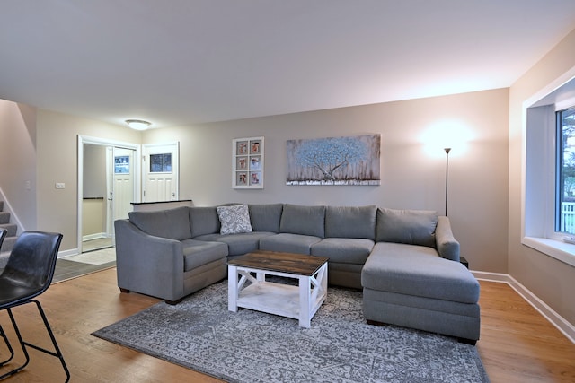 741 E Division St, Lombard, IL 60148 - living room featuring wood finished floors, stairway, and baseboards
