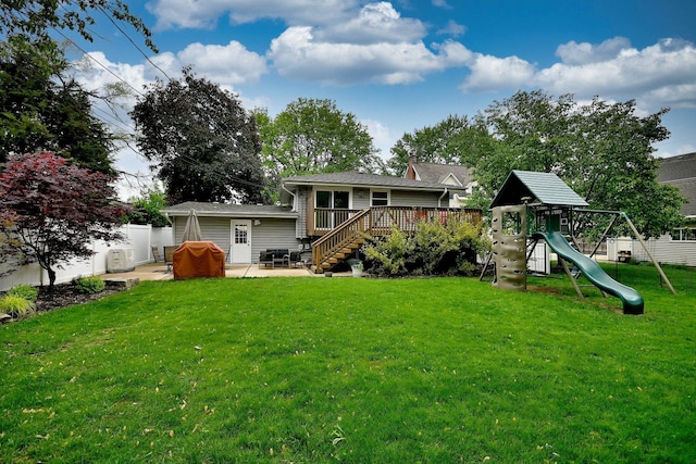 741 E Division St, Lombard, IL 60148 - back of property with a patio, a playground, a deck, and a chimney