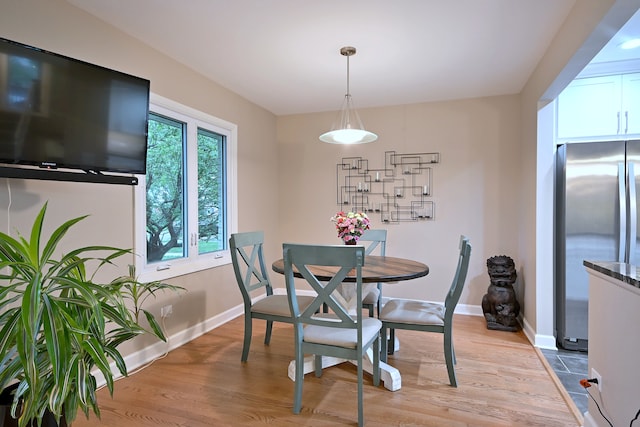 741 E Division St, Lombard, IL 60148 - dining space with baseboards and light wood-style flooring