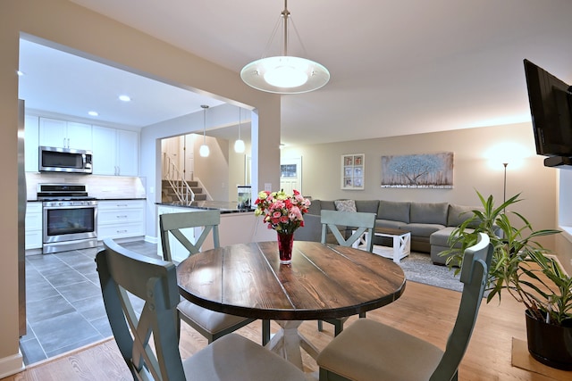 741 E Division St, Lombard, IL 60148 - dining space featuring stairs, recessed lighting, and light wood-style flooring