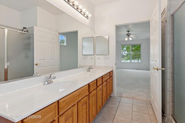 16306 Windsor Lake Ct, Crest Hill, IL 60403 - full bathroom featuring double vanity, tile patterned floors, a ceiling fan, and a shower with door