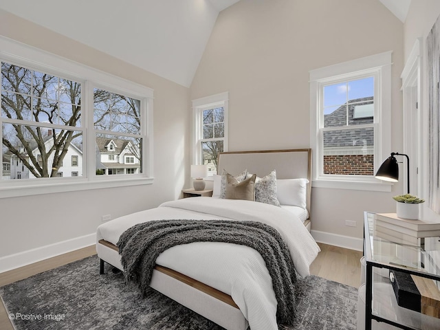 228 S Adams St, Hinsdale, IL 60521 - bedroom featuring lofted ceiling, wood finished floors, and baseboards