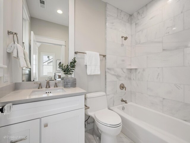 228 S Adams St, Hinsdale, IL 60521 - bathroom featuring toilet, shower / tub combination, and vanity