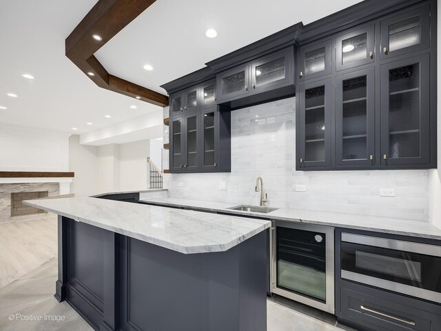 228 S Adams St, Hinsdale, IL 60521 - bar featuring stainless steel microwave, a sink, decorative backsplash, wine cooler, and recessed lighting
