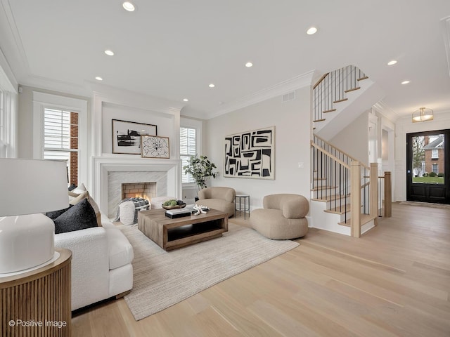 228 S Adams St, Hinsdale, IL 60521 - living room featuring crown molding, stairs, wood finished floors, recessed lighting, and a high end fireplace