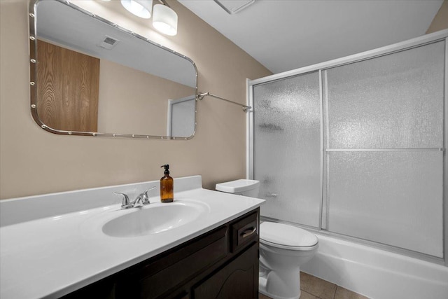 463 Valley Dr Unit 303, Naperville, IL 60563 - bathroom with toilet, vanity, tile patterned flooring, and shower / bath combination with glass door