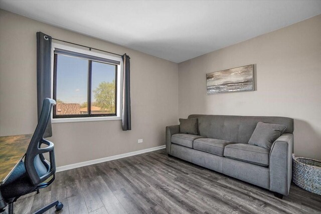 463 Valley Dr Unit 303, Naperville, IL 60563 - living room featuring wood finished floors and baseboards