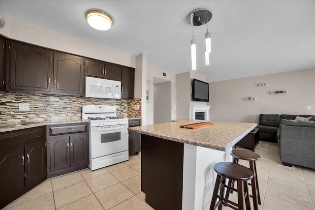463 Valley Dr Unit 303, Naperville, IL 60563 - kitchen featuring white appliances, open floor plan, light tile patterned floors, and tasteful backsplash