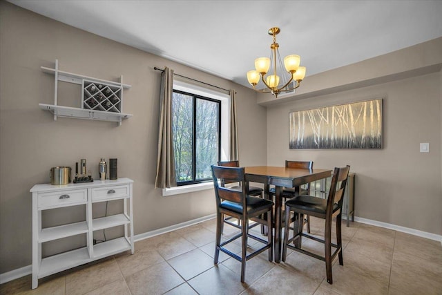 463 Valley Dr Unit 303, Naperville, IL 60563 - tiled dining room featuring a chandelier and baseboards