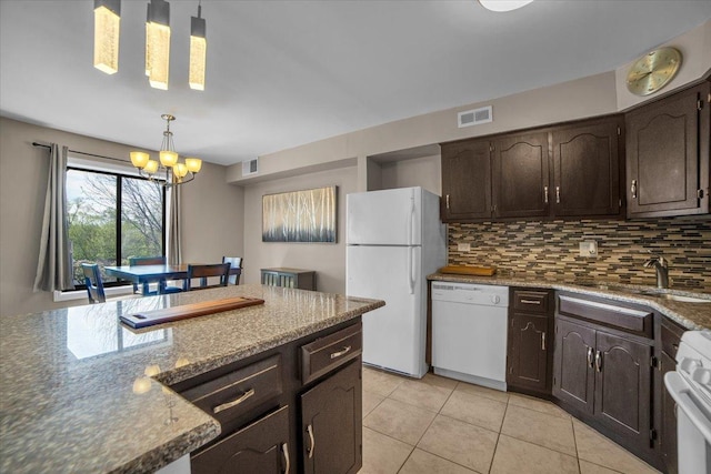 463 Valley Dr Unit 303, Naperville, IL 60563 - kitchen featuring white appliances, dark brown cabinets, backsplash, a sink, and pendant lighting