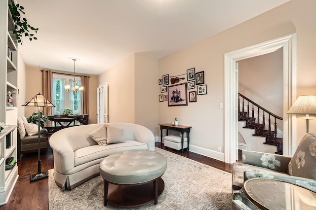2153 N Sedgwick St, Chicago, IL 60614 - living room featuring dark wood finished floors, a chandelier, stairway, and baseboards