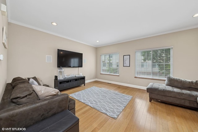 326 Southwicke Dr, Streamwood, IL 60107 - living area with ornamental molding, baseboards, light wood finished floors, and recessed lighting