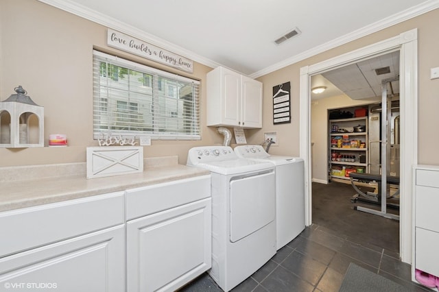 326 Southwicke Dr, Streamwood, IL 60107 - washroom with cabinet space, separate washer and dryer, ornamental molding, and dark tile patterned floors