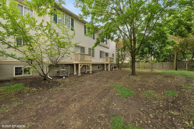 326 Southwicke Dr, Streamwood, IL 60107 - view of yard featuring cooling unit and a wooden deck