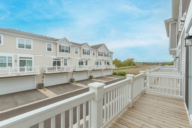 balcony with cooling unit and a residential view