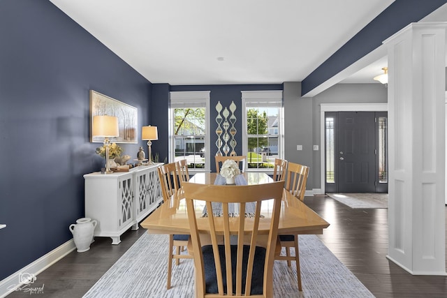 16436 S Mueller Cir, Plainfield, IL 60586 - dining space with dark wood-style floors and baseboards