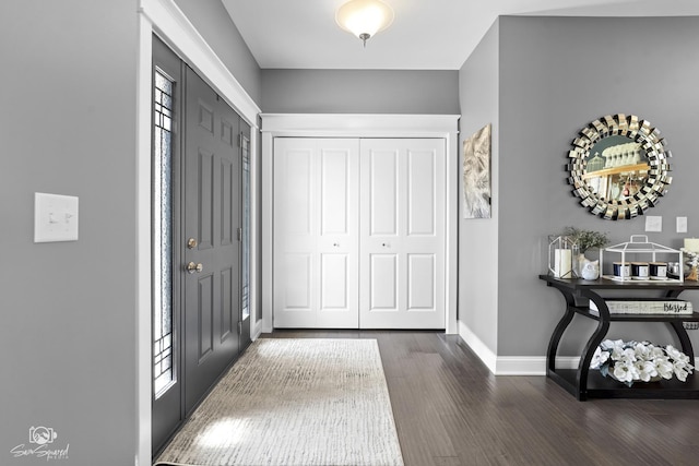 16436 S Mueller Cir, Plainfield, IL 60586 - entrance foyer featuring dark wood-type flooring and baseboards