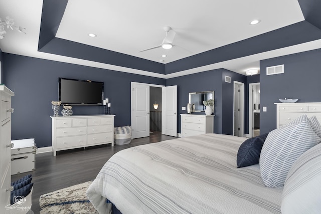 16436 S Mueller Cir, Plainfield, IL 60586 - bedroom featuring a tray ceiling, wood finished floors, baseboards, recessed lighting, and ceiling fan