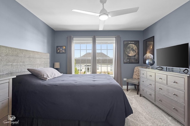 16436 S Mueller Cir, Plainfield, IL 60586 - bedroom with light colored carpet, a ceiling fan, and baseboards