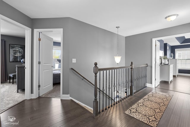 16436 S Mueller Cir, Plainfield, IL 60586 - hallway with an upstairs landing, wood finished floors, and baseboards