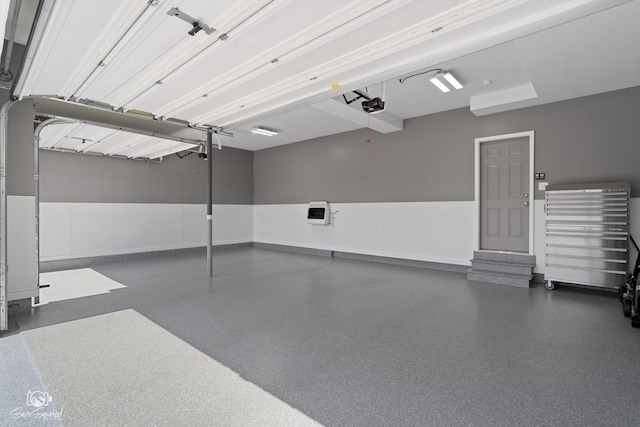 16436 S Mueller Cir, Plainfield, IL 60586 - garage with a garage door opener and baseboards