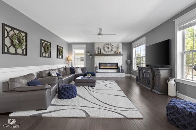16436 S Mueller Cir, Plainfield, IL 60586 - living area featuring plenty of natural light, a ceiling fan, and a fireplace