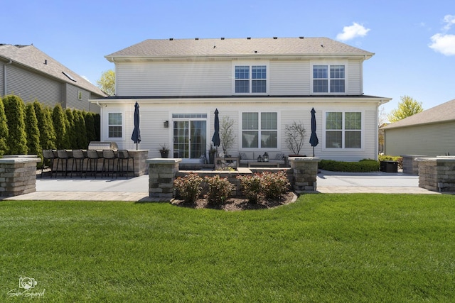 16436 S Mueller Cir, Plainfield, IL 60586 - back of house featuring a patio, a lawn, and central air condition unit