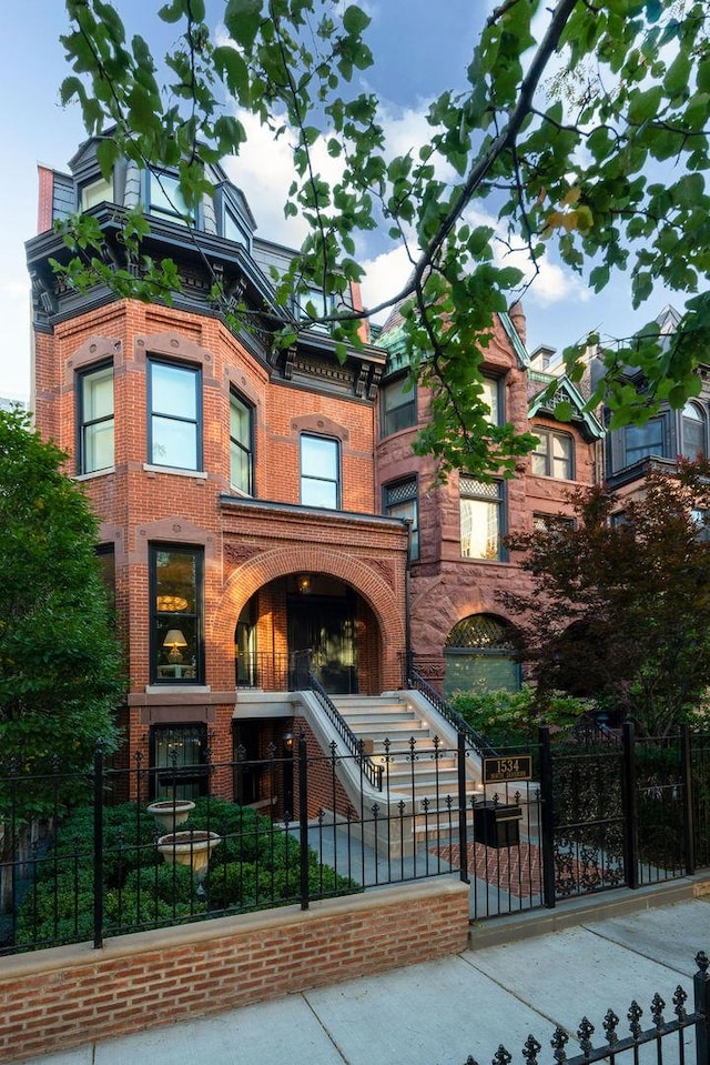 1534 N Dearborn Pkwy, Chicago, IL 60610 - view of front of property with a fenced front yard and brick siding