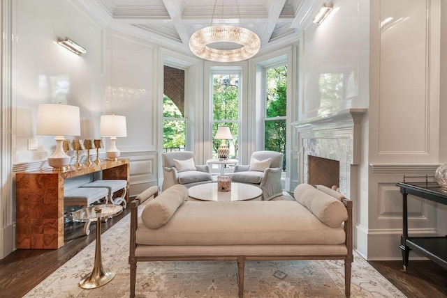 1534 N Dearborn Pkwy, Chicago, IL 60610 - sitting room featuring plenty of natural light, coffered ceiling, dark wood finished floors, crown molding, and a decorative wall