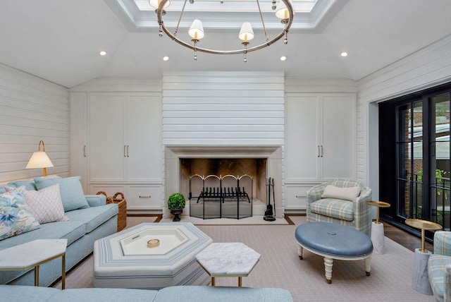 1534 N Dearborn Pkwy, Chicago, IL 60610 - carpeted living room with vaulted ceiling, recessed lighting, ornamental molding, a chandelier, and a fireplace with flush hearth