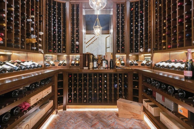 1534 N Dearborn Pkwy, Chicago, IL 60610 - wine room with a chandelier and brick flooring