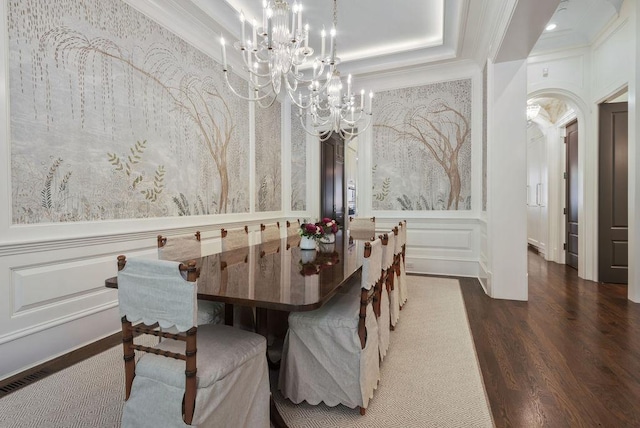 1534 N Dearborn Pkwy, Chicago, IL 60610 - dining area featuring a decorative wall, a chandelier, wood finished floors, crown molding, and wallpapered walls
