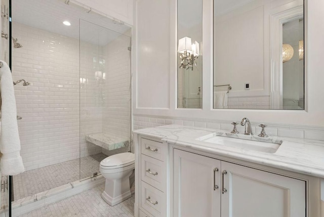 1534 N Dearborn Pkwy, Chicago, IL 60610 - bathroom featuring vanity, a shower stall, toilet, and tile patterned floors