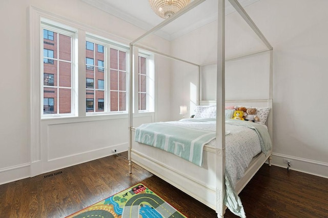 1534 N Dearborn Pkwy, Chicago, IL 60610 - bedroom with crown molding, baseboards, and wood finished floors