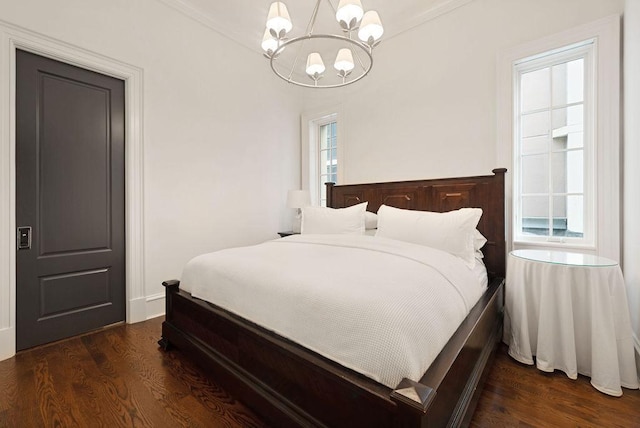 1534 N Dearborn Pkwy, Chicago, IL 60610 - bedroom featuring a chandelier and dark wood finished floors