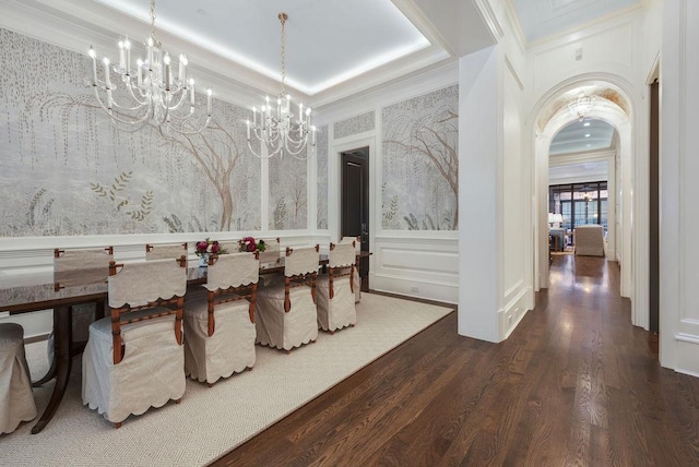 1534 N Dearborn Pkwy, Chicago, IL 60610 - dining space with a chandelier, wainscoting, wood finished floors, wallpapered walls, and arched walkways