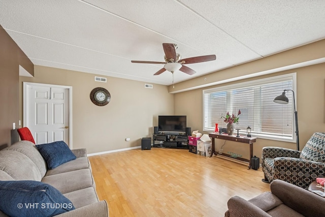 395 Graceland Ave Unit 202, Des Plaines, IL 60016 - living area with wood finished floors, ceiling fan, and baseboards