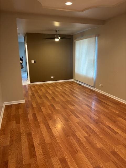 7941 S Woodlawn Ave, Chicago, IL 60619 - empty room featuring wood finished floors, baseboards, a ceiling fan, and recessed lighting