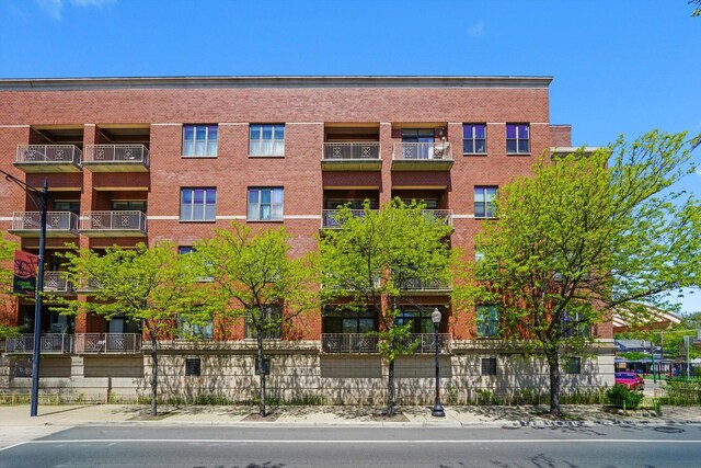 3300 W Irving Park Rd Unit F4, Chicago, IL 60618 - view of apartment building / complex