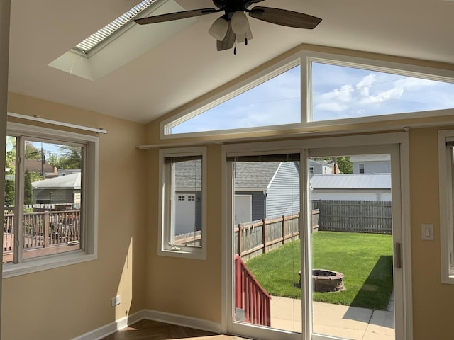 7835 W Berwyn Ave, Chicago, IL 60656 - doorway with lofted ceiling, ceiling fan, and baseboards