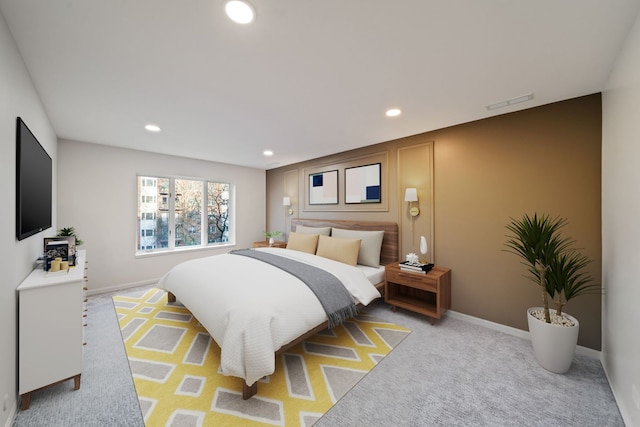 bedroom featuring recessed lighting, baseboards, and light colored carpet