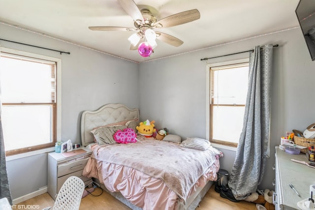 4 E Streamwood Blvd, Streamwood, IL 60107 - bedroom with light wood-style floors and ceiling fan