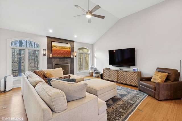 20662 Francisca Way, Frankfort, IL 60423 - living area with a ceiling fan, a tile fireplace, wood finished floors, recessed lighting, and high vaulted ceiling