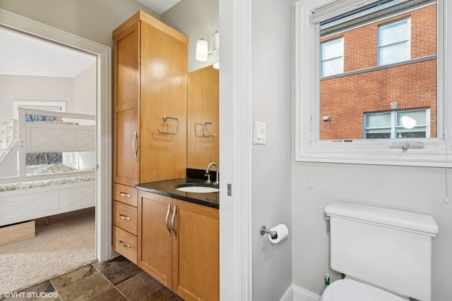 20662 Francisca Way, Frankfort, IL 60423 - bathroom with toilet, vanity, ensuite bath, and baseboards