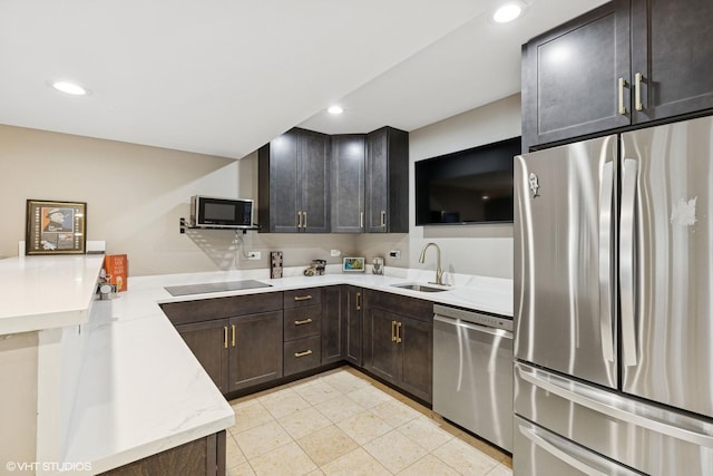 20662 Francisca Way, Frankfort, IL 60423 - kitchen featuring black appliances, a sink, a peninsula, recessed lighting, and dark brown cabinetry
